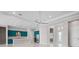 Modern kitchen with stylish cabinets, stainless steel appliances, and a spacious island at 4779 Pastel Ct, Sarasota, FL 34240