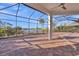 Expansive screened patio with brick flooring, perfect for outdoor entertaining and relaxation at 4779 Pastel Ct, Sarasota, FL 34240