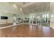 Spacious studio with ballet bar, mirrors, and hardwood floors, ideal for fitness or dance classes at 4779 Pastel Ct, Sarasota, FL 34240