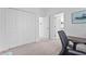 A neutral bedroom with large closet space, connecting to an adjacent room for flexible living at 5107 Coral Reef Way, Bradenton, FL 34211