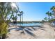 Stunning resort-style pool with ocean views at 5635 Gulf Of Mexico Dr # 103, Longboat Key, FL 34228