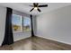 Bedroom featuring luxury vinyl plank flooring, ceiling fan and lots of light at 5658 Silverbridge Trl, Bradenton, FL 34211