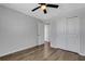 Bedroom featuring luxury vinyl plank flooring and large closets at 5658 Silverbridge Trl, Bradenton, FL 34211