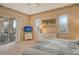 Spacious bedroom with sliding glass doors leading to patio at 6504 Copper Ridge Trl, Bradenton, FL 34201