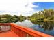 Relaxing view from a wooden dock overlooking a tranquil canal at 6504 Copper Ridge Trl, Bradenton, FL 34201