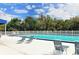 Inviting community pool with lounge chairs at 6504 Copper Ridge Trl, Bradenton, FL 34201