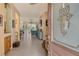Bright and airy entryway with tile floors and view into living area at 6504 Copper Ridge Trl, Bradenton, FL 34201