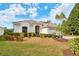 Charming single-story home with a well-manicured lawn and beautiful landscaping at 6504 Copper Ridge Trl, Bradenton, FL 34201