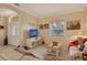 Cozy living room with neutral decor and comfortable seating at 6504 Copper Ridge Trl, Bradenton, FL 34201