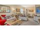 Open living space with comfortable seating and access to kitchen at 6504 Copper Ridge Trl, Bradenton, FL 34201