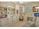 Bright office with built-in shelving and window at 6504 Copper Ridge Trl, Bradenton, FL 34201