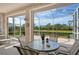 Enjoy serene views from this screened patio overlooking a canal at 6504 Copper Ridge Trl, Bradenton, FL 34201