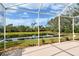 Relaxing screened patio overlooking tranquil water at 6504 Copper Ridge Trl, Bradenton, FL 34201