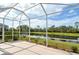 Enjoy serene water views from this screened patio at 6504 Copper Ridge Trl, Bradenton, FL 34201