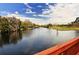 Scenic water view of the canal, showcasing lush vegetation and a serene atmosphere at 6504 Copper Ridge Trl, Bradenton, FL 34201