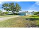 Ranch home with large yard and mature oak tree at 907 60Th Nw St, Bradenton, FL 34209