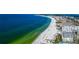 Aerial view of expansive beachfront property and coastline at 915 Seaside Dr # 604, Sarasota, FL 34242