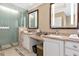 Elegant bathroom with double vanity and large shower at 915 Seaside Dr # 604, Sarasota, FL 34242