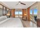 Main bedroom with king bed and access to a private balcony at 915 Seaside Dr # 604, Sarasota, FL 34242