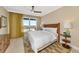 Bright bedroom featuring a comfortable bed and city views at 915 Seaside Dr # 604, Sarasota, FL 34242