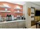 Community coffee bar with coffee makers and tea selections at 915 Seaside Dr # 604, Sarasota, FL 34242