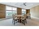 Community dining area with table and chairs at 915 Seaside Dr # 604, Sarasota, FL 34242