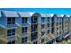 Building exterior with unique architectural details and balconies at 915 Seaside Dr # 604, Sarasota, FL 34242