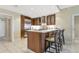 Open concept kitchen with island and bar seating at 915 Seaside Dr # 604, Sarasota, FL 34242