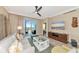 Living room with balcony access and city views at 915 Seaside Dr # 604, Sarasota, FL 34242