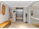 Building lobby with elevator, seating, and hand sanitizer at 915 Seaside Dr # 604, Sarasota, FL 34242