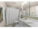 Clean bathroom with shower/tub and white vanity at 9397 Midnight Pass Rd # 906, Sarasota, FL 34242