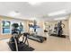 Well-equipped fitness center with cardio machines and weights at 9397 Midnight Pass Rd # 906, Sarasota, FL 34242