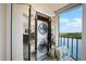 Convenient laundry room with stackable washer/dryer at 9397 Midnight Pass Rd # 906, Sarasota, FL 34242