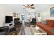 Open concept living room with seating and ocean view at 9397 Midnight Pass Rd # 906, Sarasota, FL 34242