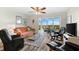 Relaxing living room with comfy seating and ocean view at 9397 Midnight Pass Rd # 906, Sarasota, FL 34242