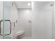 Walk-in shower with bench and glass enclosure at 9397 Midnight Pass Rd # 906, Sarasota, FL 34242