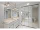 Bathroom with marble tile and double vanity at 964 E Gondola Dr, Venice, FL 34293