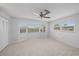 Bright bedroom with ample closet space and a large window at 964 E Gondola Dr, Venice, FL 34293