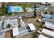 Aerial view showing community pool, shuffleboard, and mobile homes at 10315 Cortez W Rd # 47-2, Bradenton, FL 34210