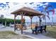 Relaxing waterfront gazebo with swings and benches at 10315 Cortez W Rd # 47-2, Bradenton, FL 34210