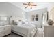 Comfortable bedroom with a queen-size bed and window at 1064 N Tamiami Trl # 1414, Sarasota, FL 34236