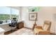 Home office with built-in desk and comfortable chair at 1103 Citrus Ave, Sarasota, FL 34236