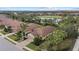 Aerial view of a luxury home community with golf course and lake at 12606 Fontana Loop, Bradenton, FL 34211