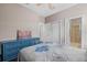 Bedroom with blue dresser and en-suite bathroom at 12606 Fontana Loop, Bradenton, FL 34211