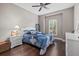 Bright bedroom with a comfortable bed and hardwood floors at 12606 Fontana Loop, Bradenton, FL 34211