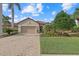 Beautiful single-story home with a two-car garage and nicely landscaped yard at 12606 Fontana Loop, Bradenton, FL 34211