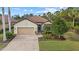 Single-Gathering home with tile roof and landscaped yard at 12606 Fontana Loop, Bradenton, FL 34211