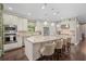 Island kitchen with granite countertops and custom cabinetry at 12606 Fontana Loop, Bradenton, FL 34211