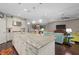 Open concept kitchen with large island and breakfast bar at 12606 Fontana Loop, Bradenton, FL 34211