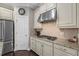 Spacious kitchen with granite countertops and stainless steel appliances at 12606 Fontana Loop, Bradenton, FL 34211